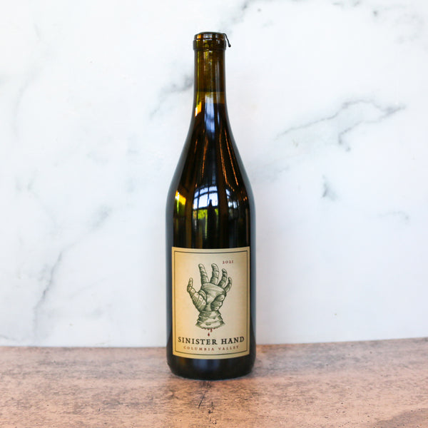 A bottle of Owen Roe Sinister Hand Columbia Valley wine available at TASTE across costal Virginia and Richmond and online at TASTE.online