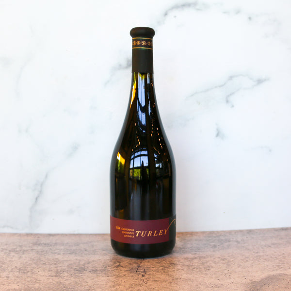 Wine bottle with 'Turley' label on a marble surface, available at taste.online