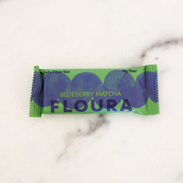 Blue and Green Matcha fiber bar on a marble background