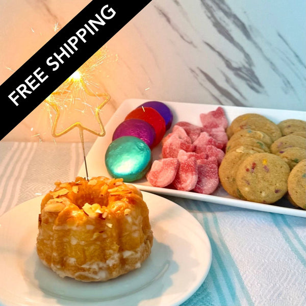 Decorative cake with colorful ornaments and cookies on a marble surface, with 'Free Shipping' text overlay.