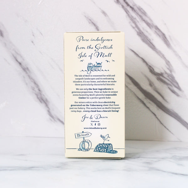 Product packaging for  Island Bakery Lemon Melts with text and illustrations on a marble surface