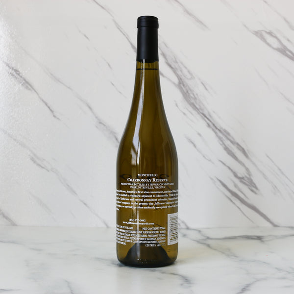 Wine bottle with label on a marble surface