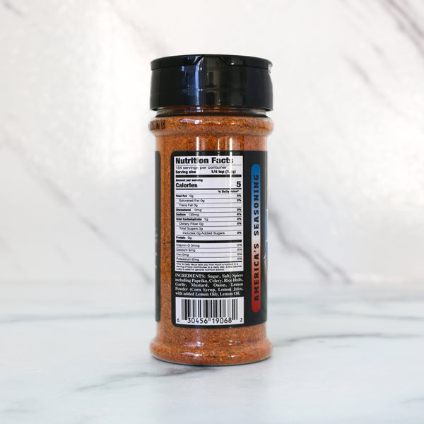 Spice jar, Mad Blue Seasoning nutrition and ingredients,  with label on a white marble background. All MaD Seasonings come from Matt Starcher, aka The MattDad, aka @themattdad, a culinary pro, instructor and contestant on Next Level Chef with Gordon Ramsay (Season 5). That chef-driven pedigree shows in every blend.