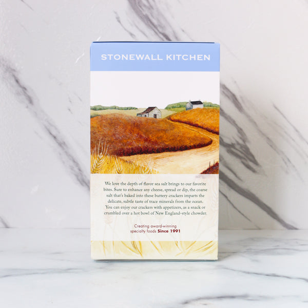 Stonewall Kitchen rear product packaging with a scenic illustration on a marble background