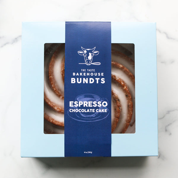 Taste Bakehouse Espresso chocolate bundt cake in a blue box on a marble surface