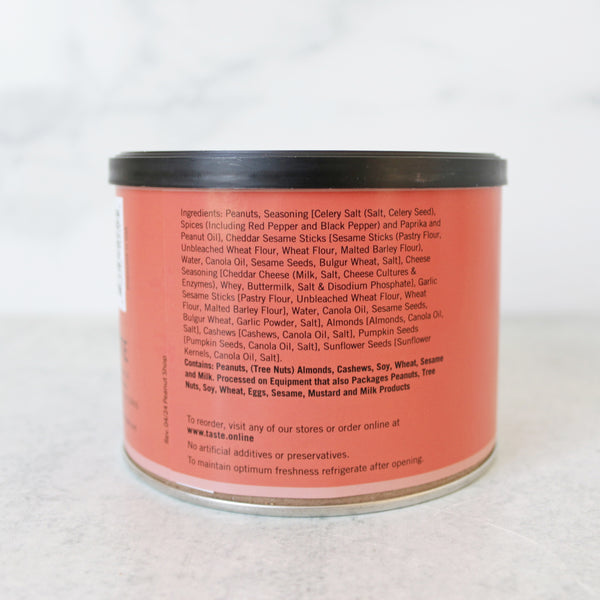  A can of TASTE Crab Crunch snack mix showing the back with ingredients. 
