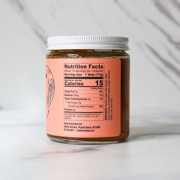 Jar with TASTE Virginia Hot PEACH Chutney nutrition facts label on a light background