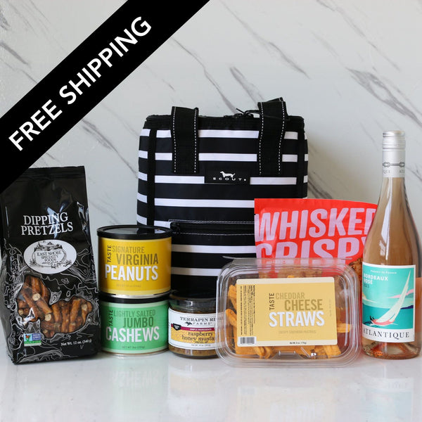 TASTE Shore line shipper giftw with virginia peanuts and snacks, a blackand white striped insulated bag and some Atlantique rose