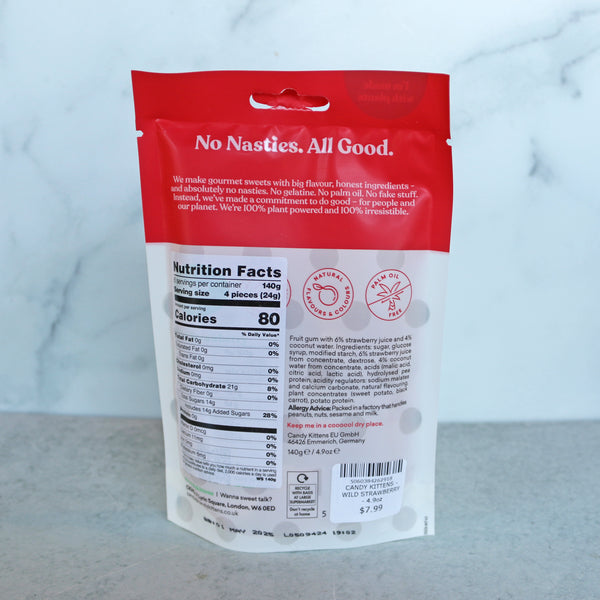 A bag of Candy Kittens Wild Strawberry gummies displayed against a marble background.
