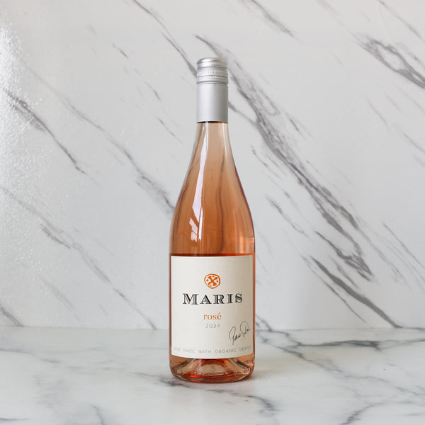 Bottle of Maris Rosé wine on a marble background