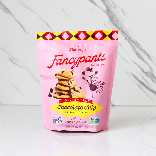 Pink package of Fancypants gluten-free chocolate chip cookies on a white background
