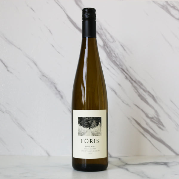 Wine bottle labeled 'FORIS' on a marble surface