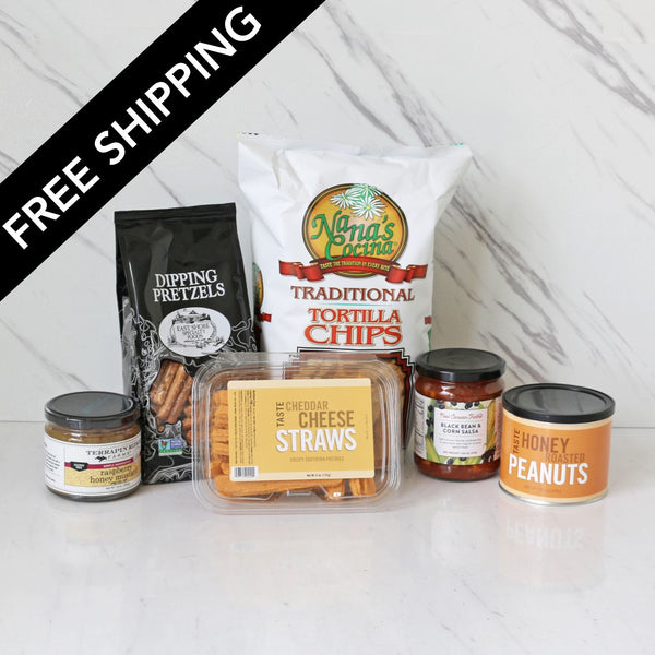 Assorted snack items including tortilla chips, cheese straws, and honey roasted peanuts on a marble surface with 'Free Shipping' text overlay.