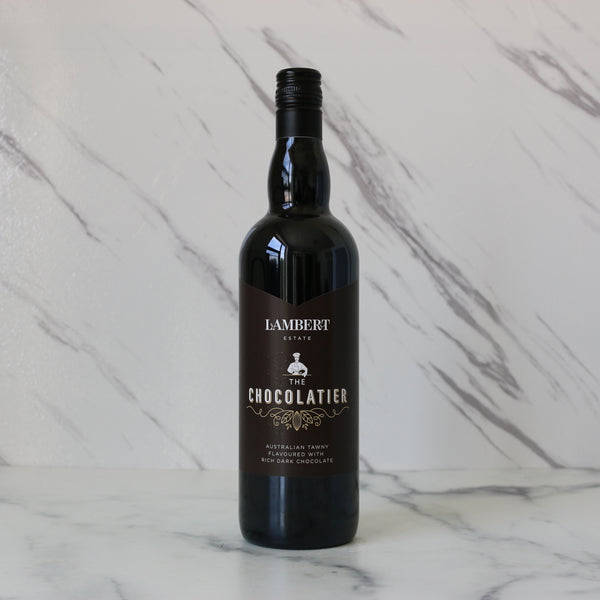 Bottle of Lambert Estate The Chocolatier wine on a marble background