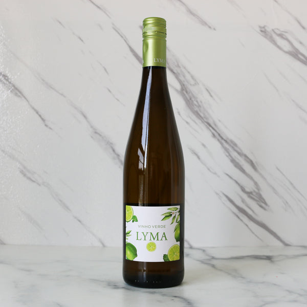 Bottle of Lyma vinho verde wine on a marble background