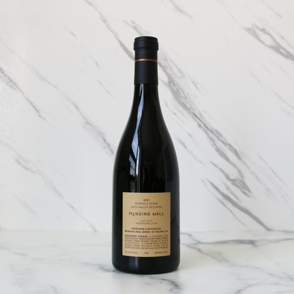 Wine bottle with a label on a marble background