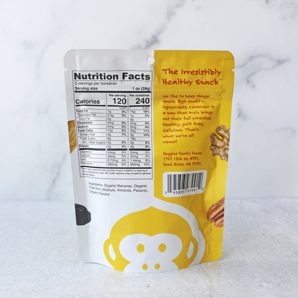 the back of a packaged snack product called Monkey Brittle, from huggins family farms, showing nutrition facts and ingredients