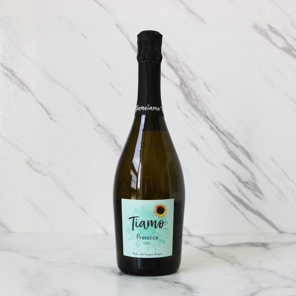 Bottle of Tiamo Prosecco on a marble background