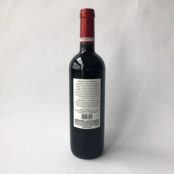 A bottle of 2017 Barboursville Cabernet Sauvignon wine with a red cap, labeled with the brand and vintage, on a white background.