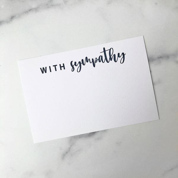 A gift enclosure card with the text 'with sympathy. 