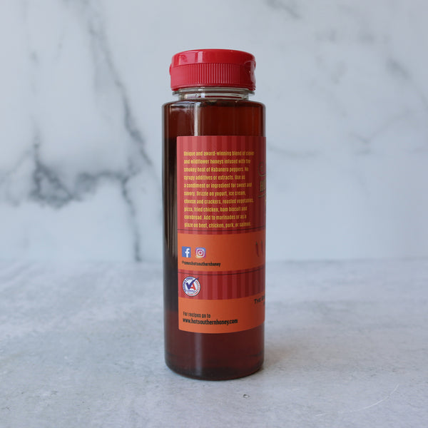 A 12oz squeezable plastic bottle of AR's Hot-Hot Southern Honey with a red flip-top cap, labeled for retail sale.