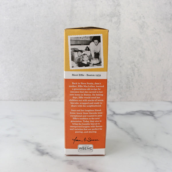the side of A packaged product labeled 'Effie's Homemade Oatcake Biscuit Crackers' displayed on a marble surface.