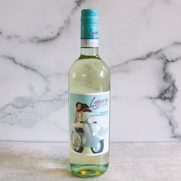 A bottle of Lagaria Delle Venezie Pinot Grigio wine positioned in front of a marble background.